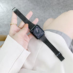 steel replacement strap for Apple Watch shown on hand with black dial and mesh design in modern setting
