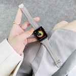 apple watch steel replacement strap displayed on wrist with colorful watch face and elegant design.