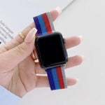 Milanese replacement strap for Apple Watch displayed on a hand, featuring a stylish four-color design.